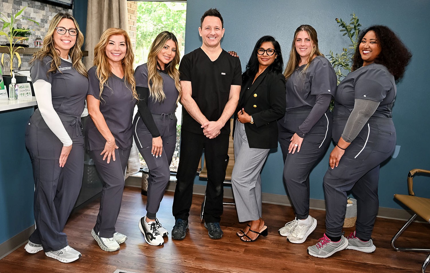 The Jackson Dentistry team together in our Eustis office